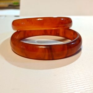 🍊🍊Pair of Marbled orange Bakelite bangles